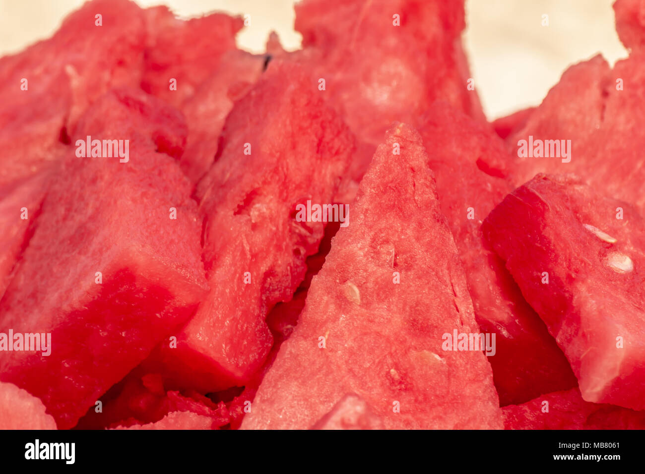 Frische organische Schichten von reifen roten Wassermelone Citrullus lanatus Stockfoto