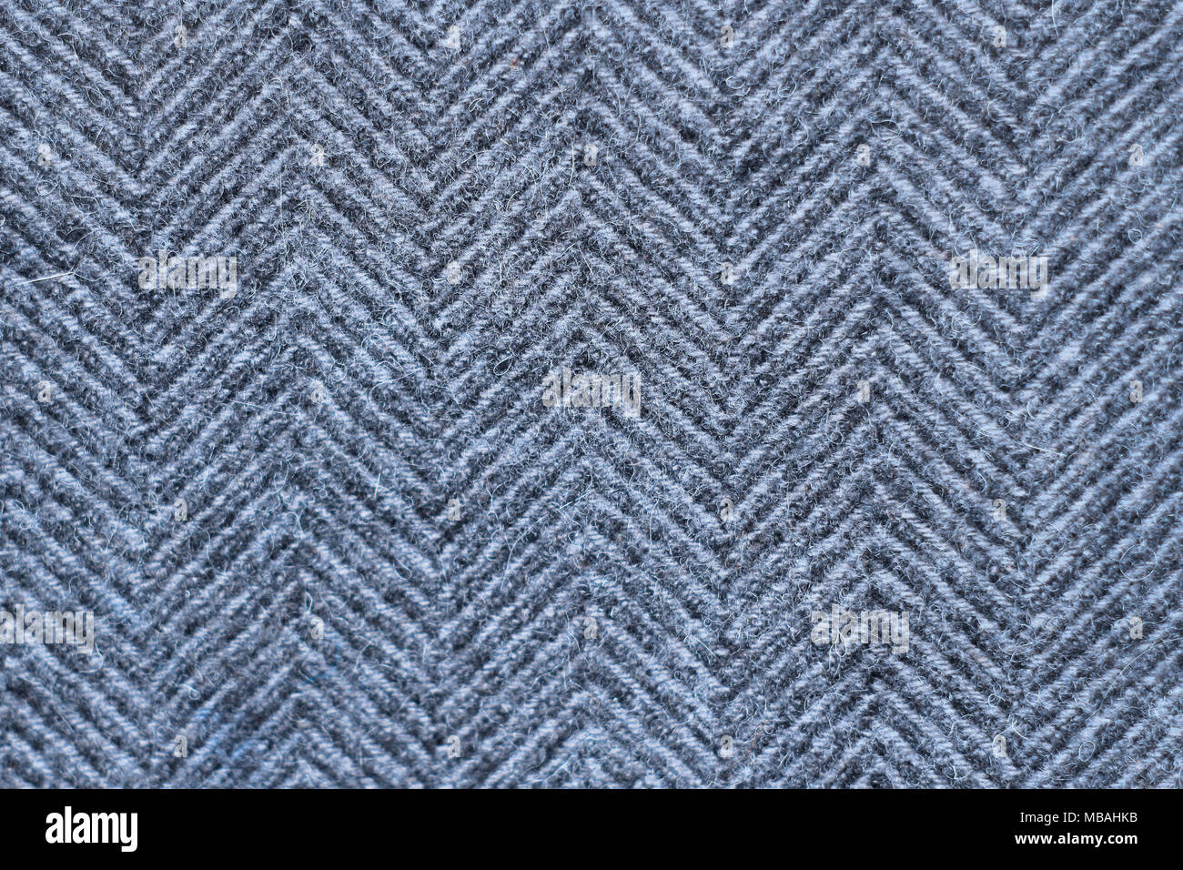 Graue Tweed textile Muster. Texturen und Hintergründe Stockfoto