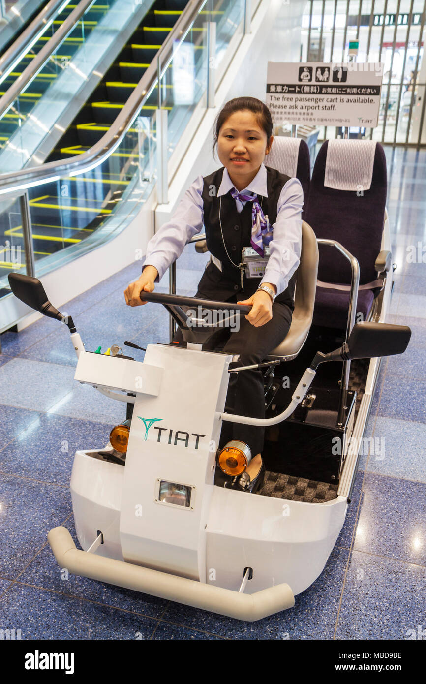 Tokyo Japan,Haneda Airport,Kanji,characters,Symbols,Japanese English,employee worker working staff,staff,Electric Cart,Passenger Assistance,tr Stockfoto