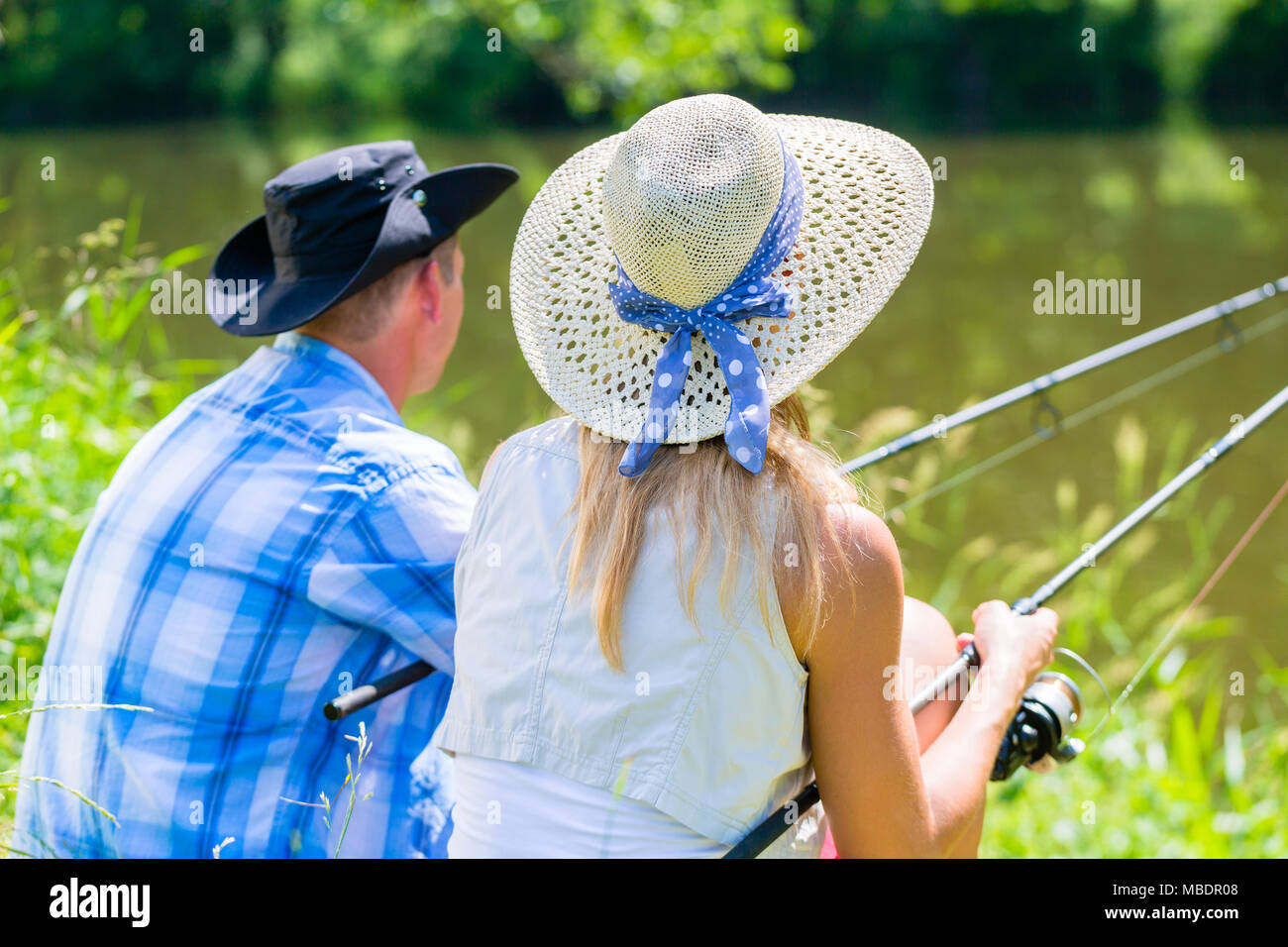 Paar, Mann und Frau, mit Angelruten Sport Angeln Stockfoto