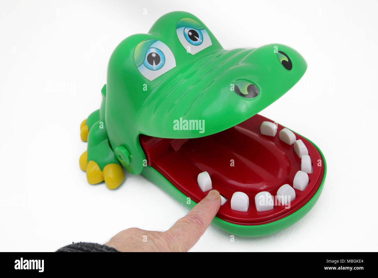 Krokodil Mund Zahnarzt beißen Finger Spiel Lustiges Spielzeug Stockfoto