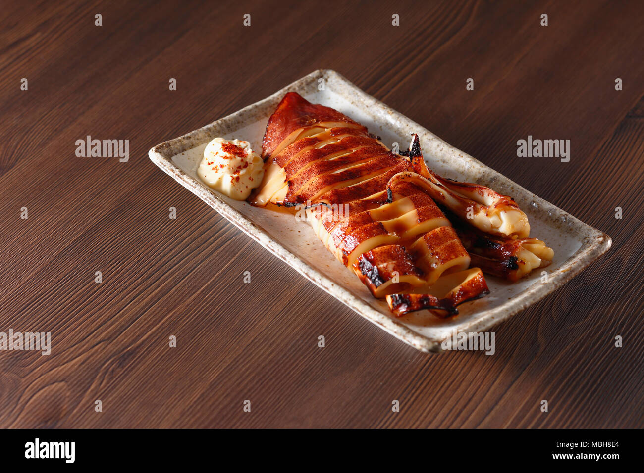 Im japanischen Stil Gegrillter Tintenfisch Stockfoto