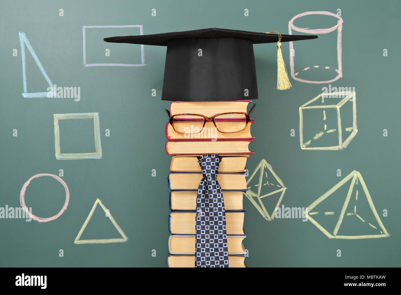 Ungewöhnliche Bildung Geometrie und stereometry Idee mit Lehrer aus Bücher Stockfoto