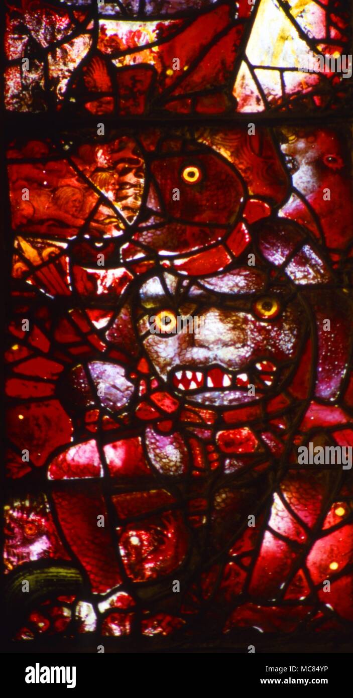 Red Daemon - Details der Glasmalerei [15 centujry) in der westlichen Wand von St. Mary's Church, Fairford. Stockfoto