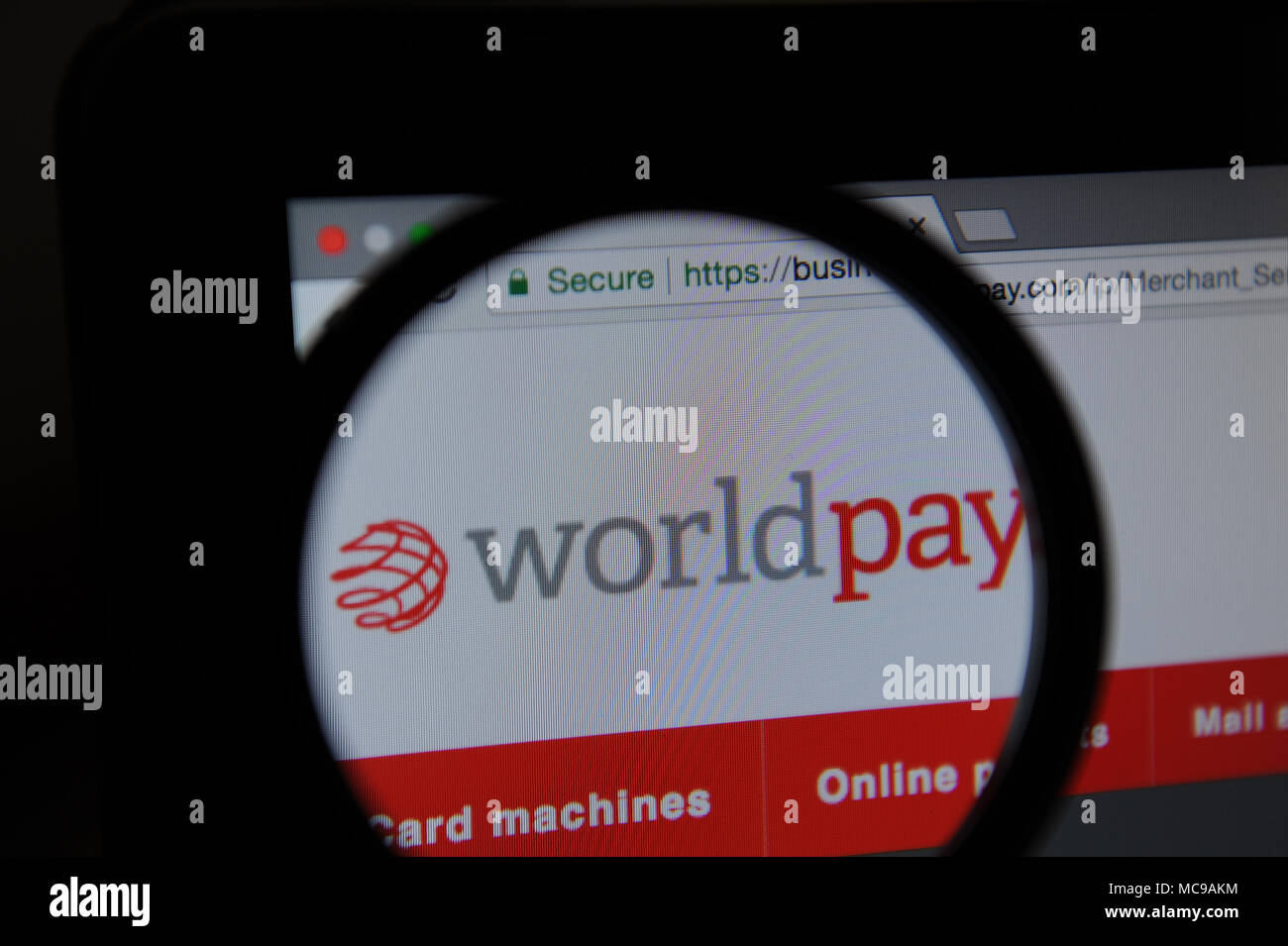 Die Worldpay Website durch ein Vergrößerungsglas gesehen Stockfoto