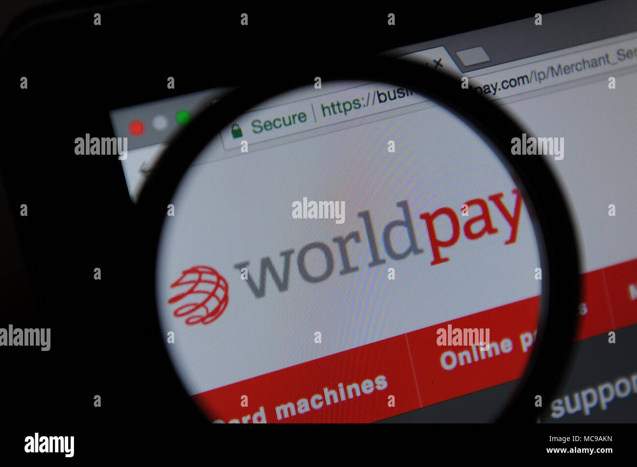 Die Worldpay Website durch ein Vergrößerungsglas gesehen Stockfoto