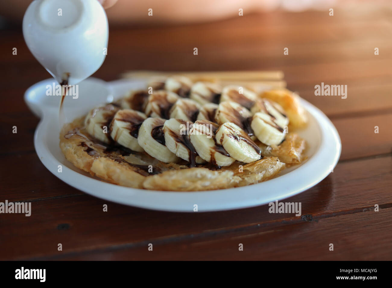Süße Nachspeise roti mit Bananen Stockfoto