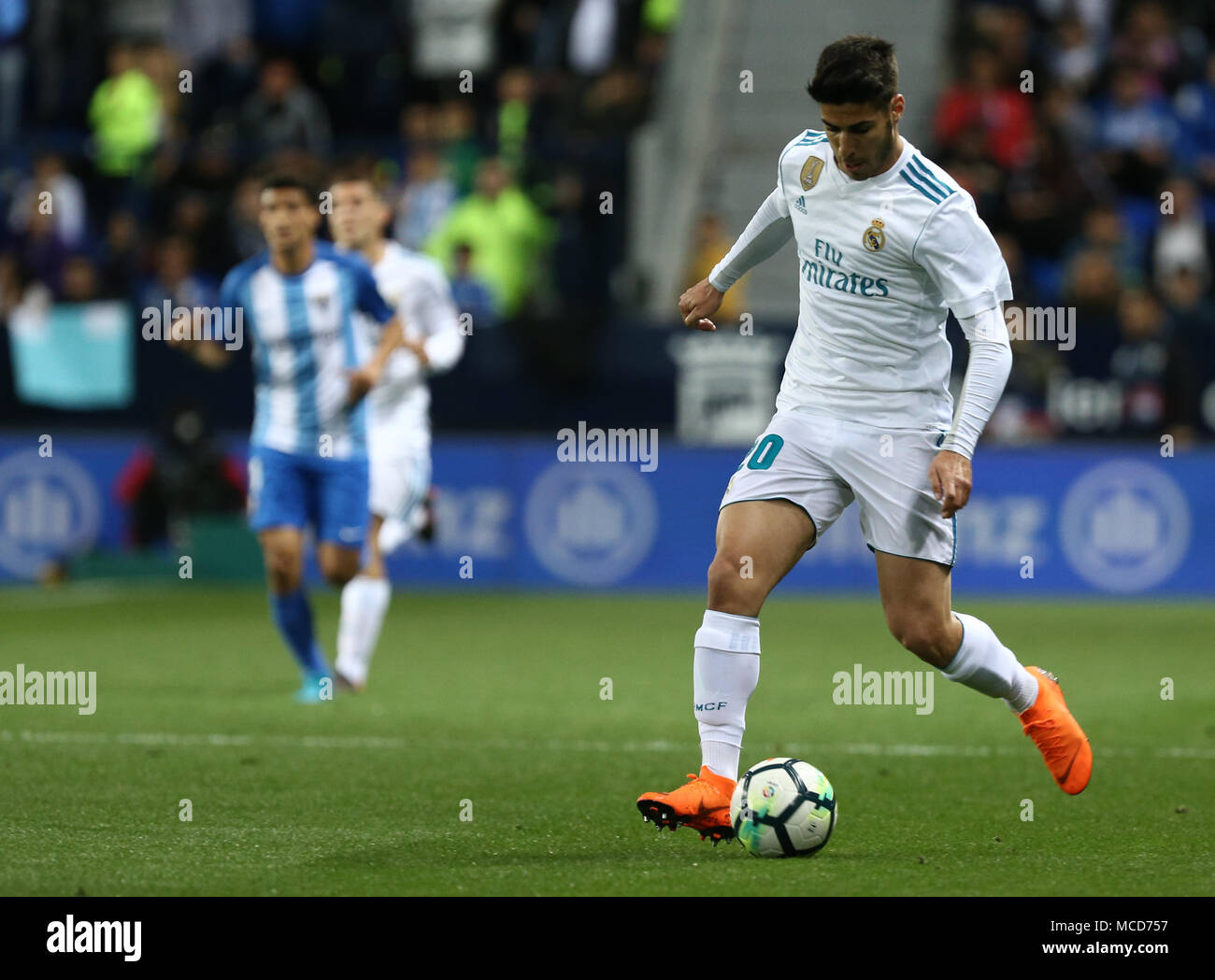 Malaga, Andalusien, Spanien. 15 Apr, 2018. Marco Asensio (Real Madrid), die in Aktion während der Liga Match zwischen Malaga CF und Real Madrid CF im Estadio La Rosaleda. Credit: Manu Reino/SOPA Images/ZUMA Draht/Alamy leben Nachrichten Stockfoto