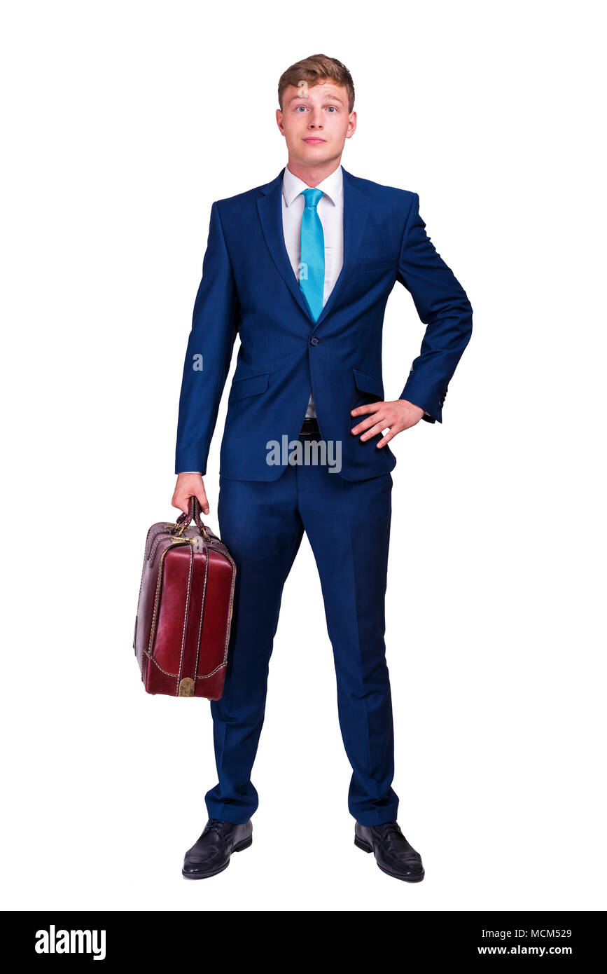 Portrait einer jungen business Mann mit einem Koffer in der Hand, in die Kamera schaut. auf weißem Hintergrund Stockfoto