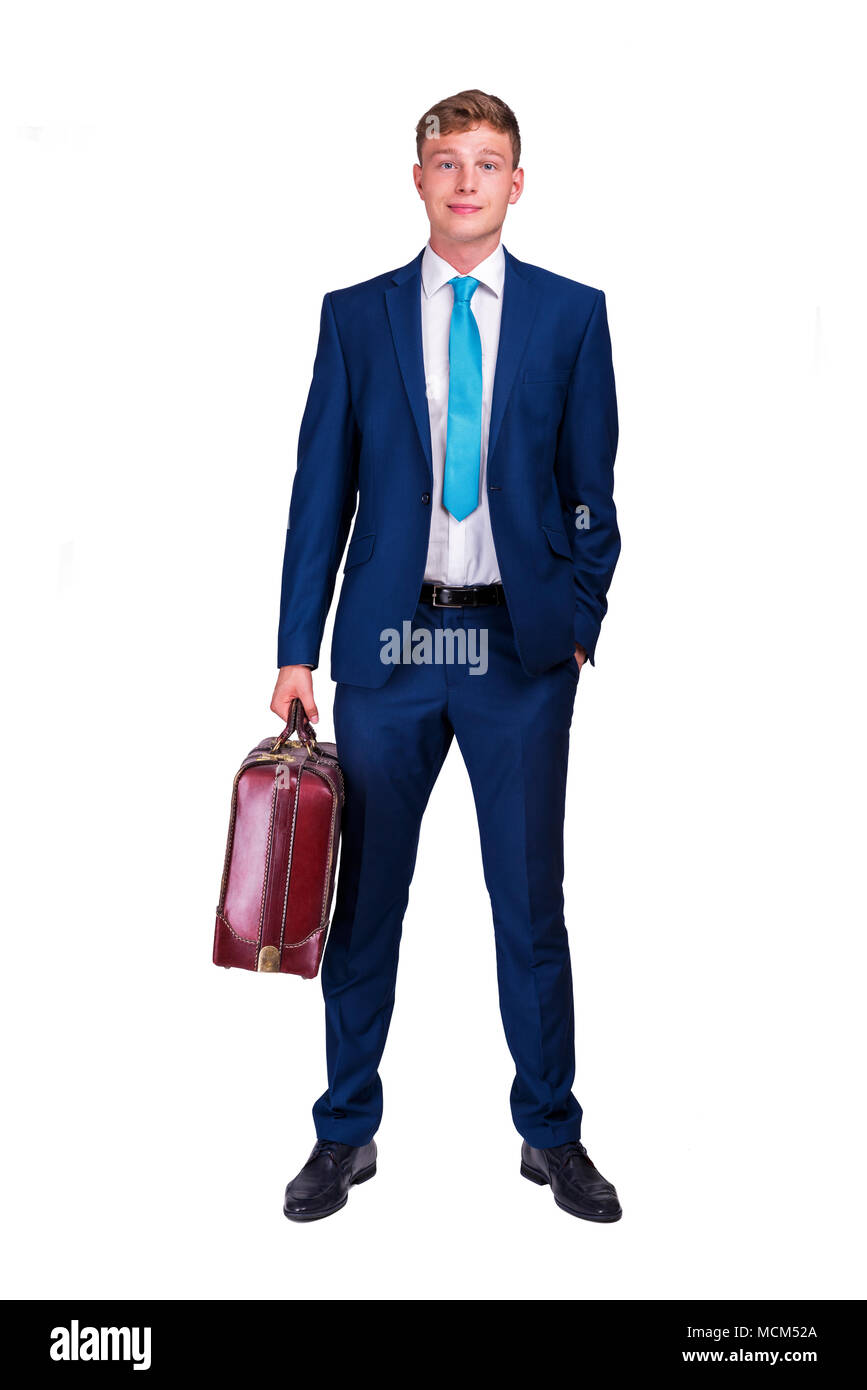 Portrait einer jungen business Mann mit einem Koffer in der Hand, in die Kamera schaut. auf weißem Hintergrund Stockfoto