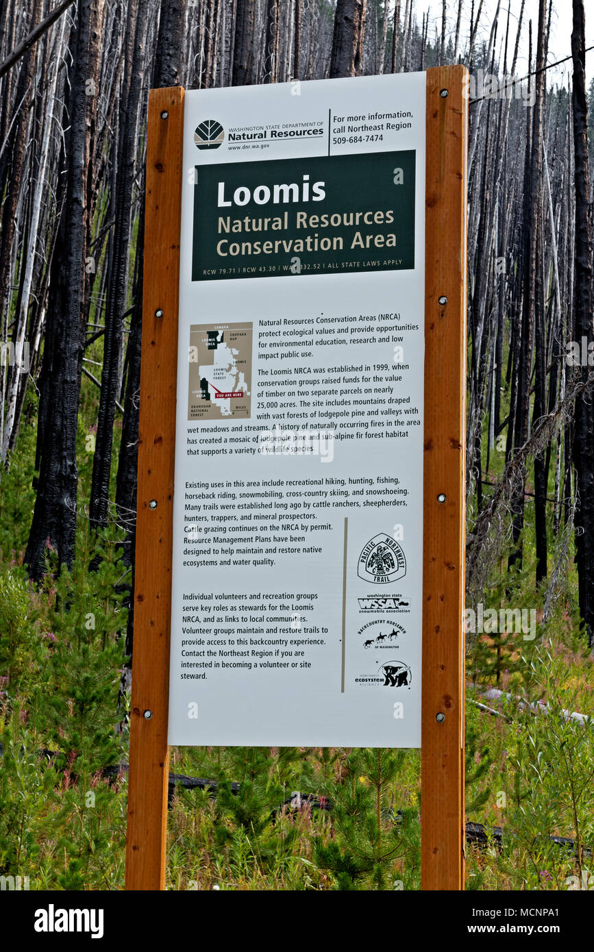 WASHINGTON - die Zeichen, die die Entstehung und den Wert der natürlichen Ressourcen Loomis Naturschutzgebiet und die Gruppen in ihrer Entstehung beteiligt. Stockfoto