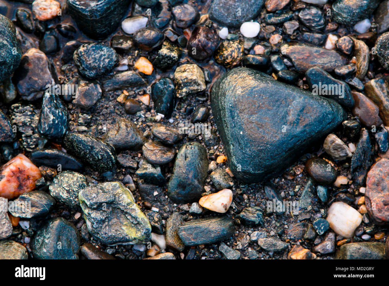 Verschiedene Größen und Arten von Steinen in einem Rahmen Stockfoto