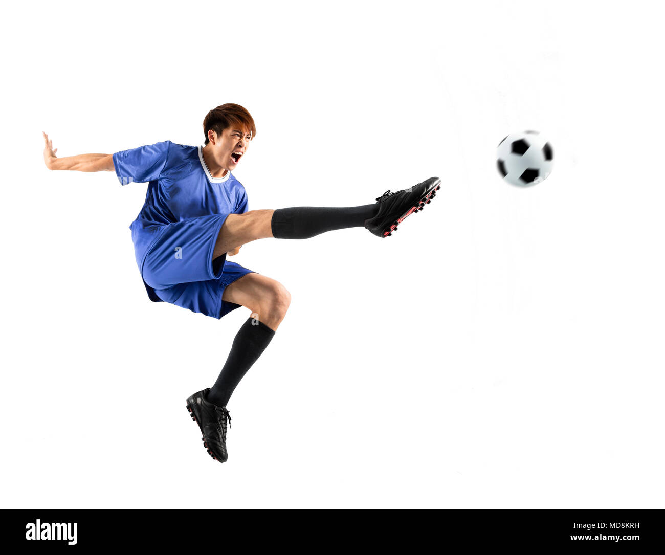 Aufgeregt soccer Player in Aktion isoliert weißer Hintergrund Stockfoto