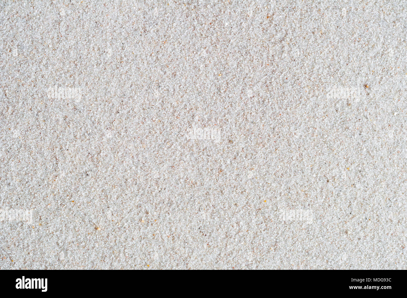Nahaufnahme Hintergrund schossen mit weißem Sand. Kiesige Textur. Stockfoto