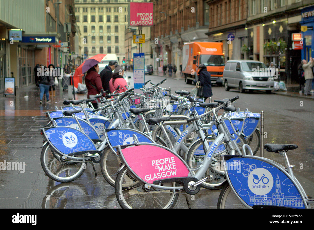 Die Leute machen Glasgow nextbike Fahrradverleih Gemeinschaft Fahrrad Projekt Queen Street, Glasgow, Großbritannien Stockfoto