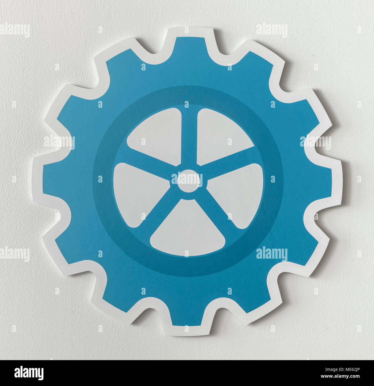 Papier Handwerk des Cog wheel Symbol Stockfoto