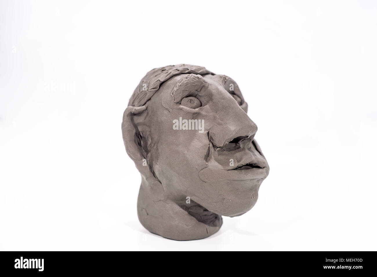 Menschliches Gesicht aus dem Spiel Ton gemacht. Auf weissem Hintergrund. Stockfoto