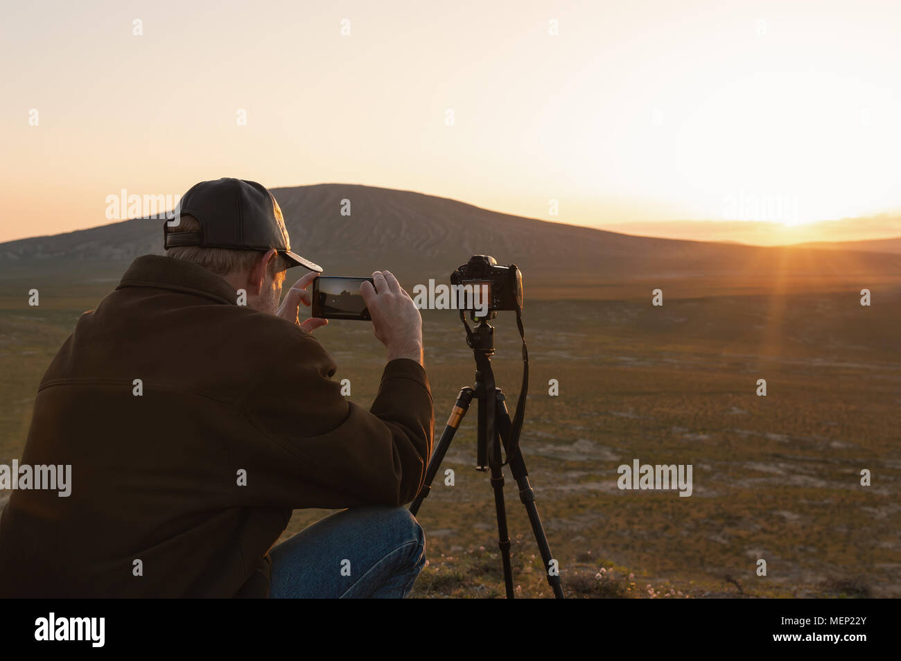 Natur Fotograf in den Bergen Stockfoto