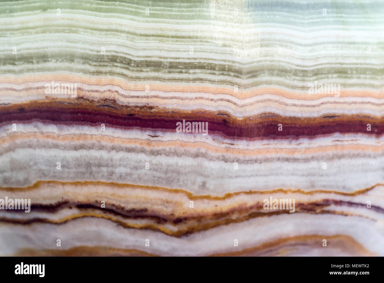 Makro Foto Textur aus poliertem onyx Stein. Fotos für die Website über Geologie, Steine, Schmuck, Handarbeit, Texturen, Art. Stockfoto