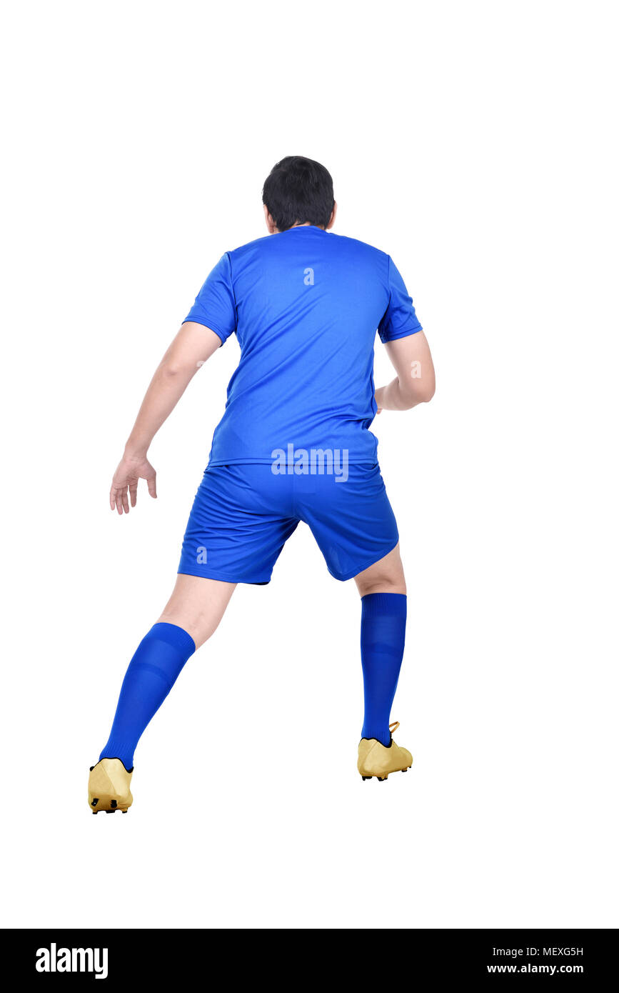 Ansicht der Rückseite des Asian Football Player in Aktion auf weißem Hintergrund Stockfoto