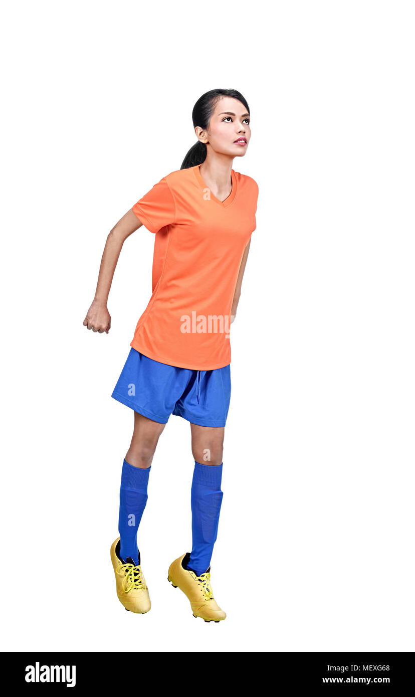 Portrait von asiatischen Fußball-Spieler Frau in Aktion auf weißem Hintergrund Stockfoto