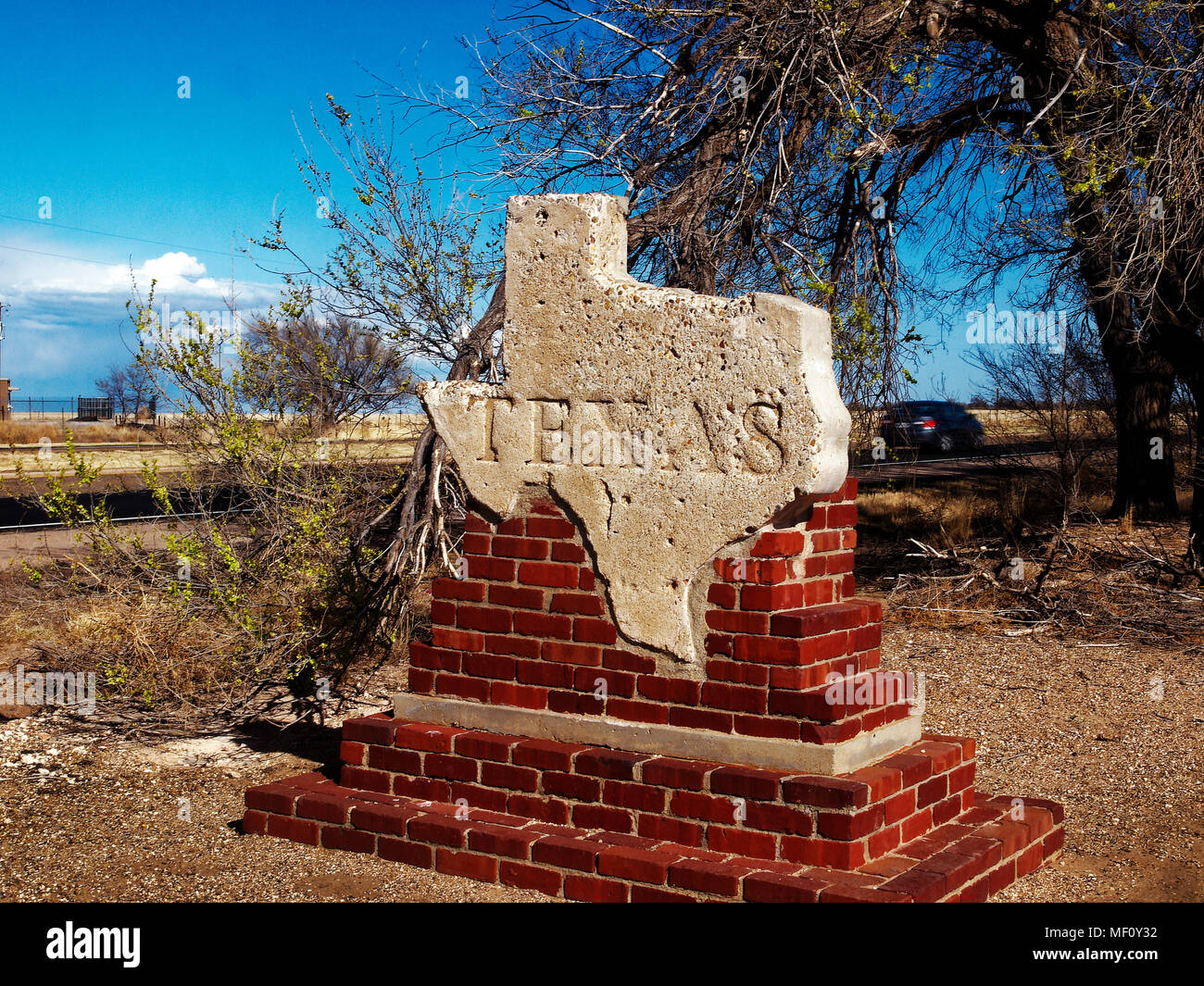 Texas marker Willkommen entlang der US 87 in der Nähe von Texline, Texas, im Sandstein Stockfoto