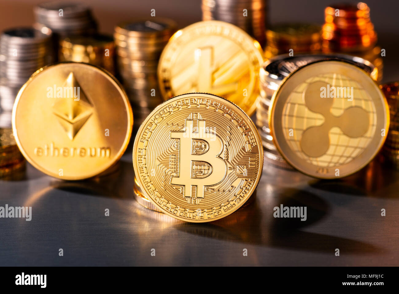 Münzen der vier crypto Währungen mit der höchsten Marktkapitalisierung Stockfoto