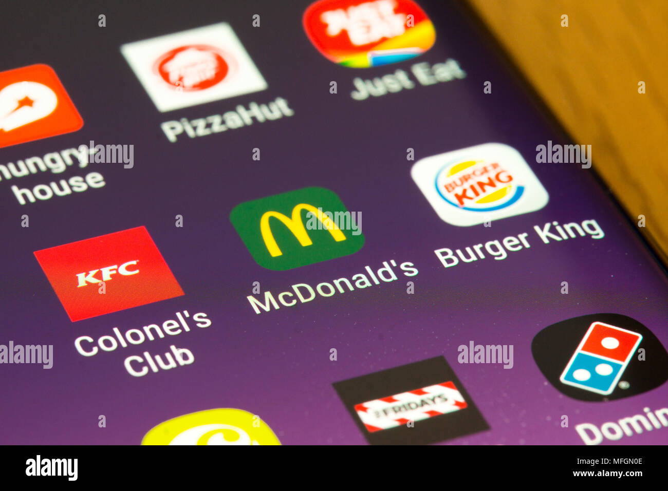 Fast food Apps auf einem Mobiltelefon scren Stockfoto
