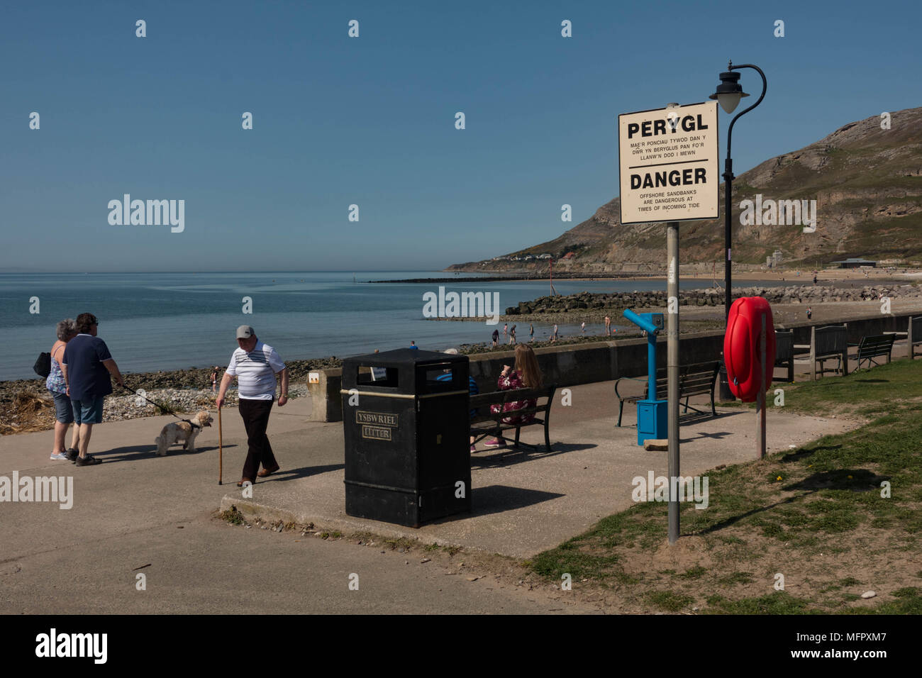 Strand bei Ebbe. Llandudno, mit dem Great Orme im Hintergrund. Conwy. Wales Stockfoto