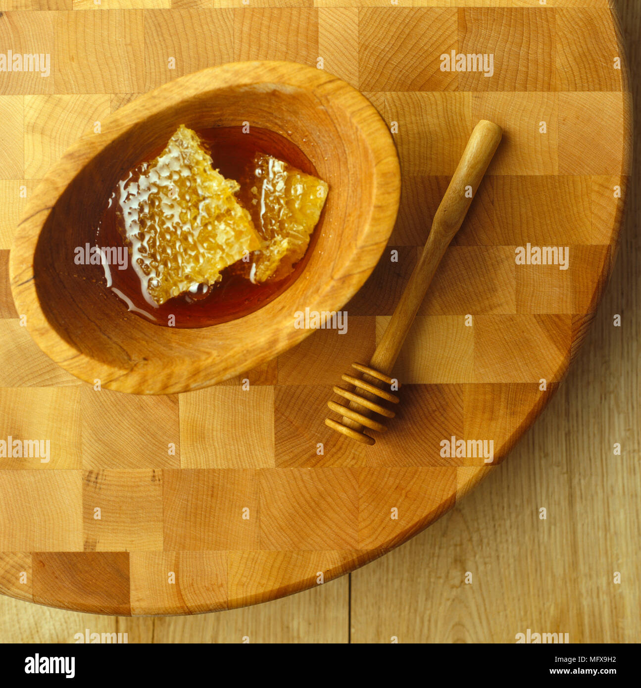 Honig in Houten mit Honig Pendelarm Stockfoto