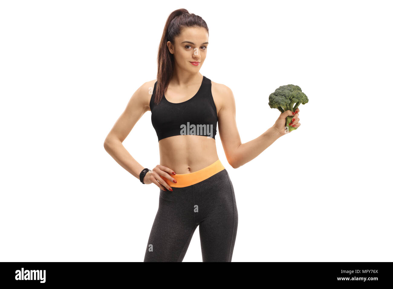 Fitness Frau mit Brokkoli auf weißem Hintergrund Stockfoto
