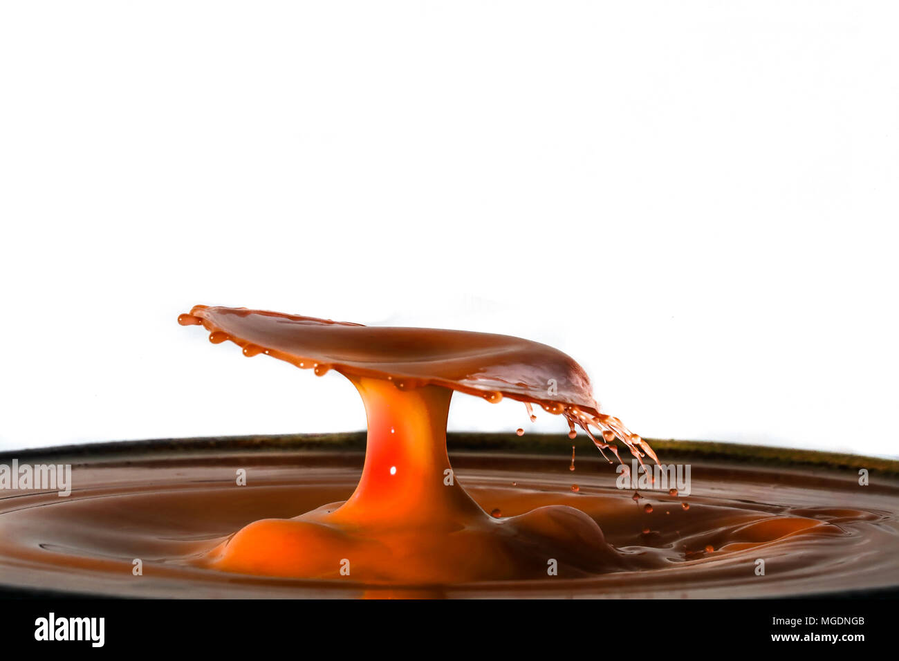 Orange Droplet Auswirkungen Makro Stockfoto