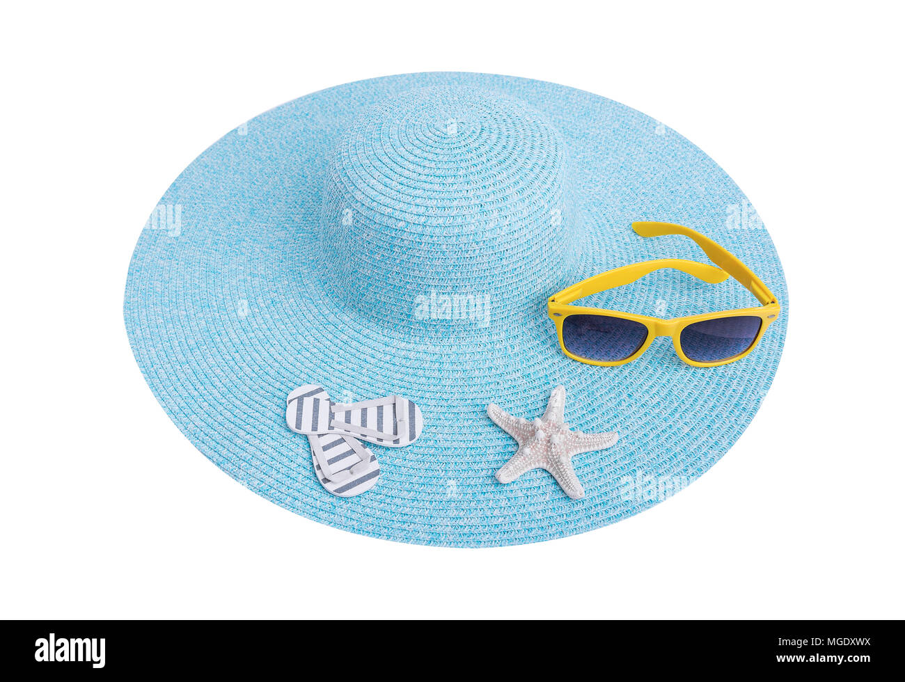 Sonnenbrille, Seesterne und Hut. Stockfoto