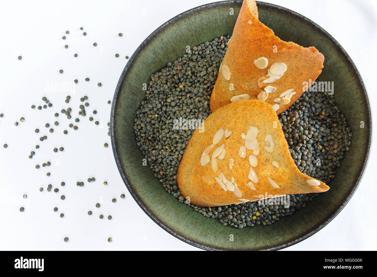 Das mit einem Michelin-Stern ausgezeichnete Küchenchef Régis Marcon' tuile de Lentilles avec amandes" Stockfoto