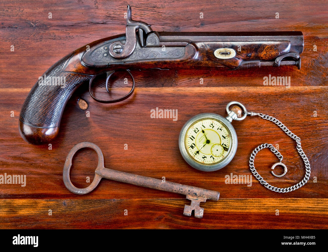 Percussion Pistole gemacht um 1840 mit Taschenuhr und skelton Key. Stockfoto