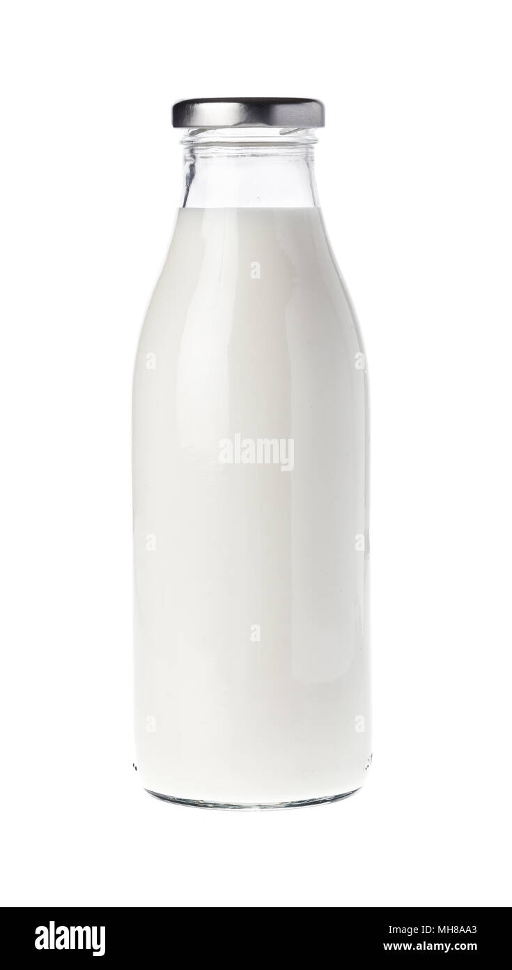 Gefüllte Glasflasche mit Milch isoliert auf Weiss Stockfotografie