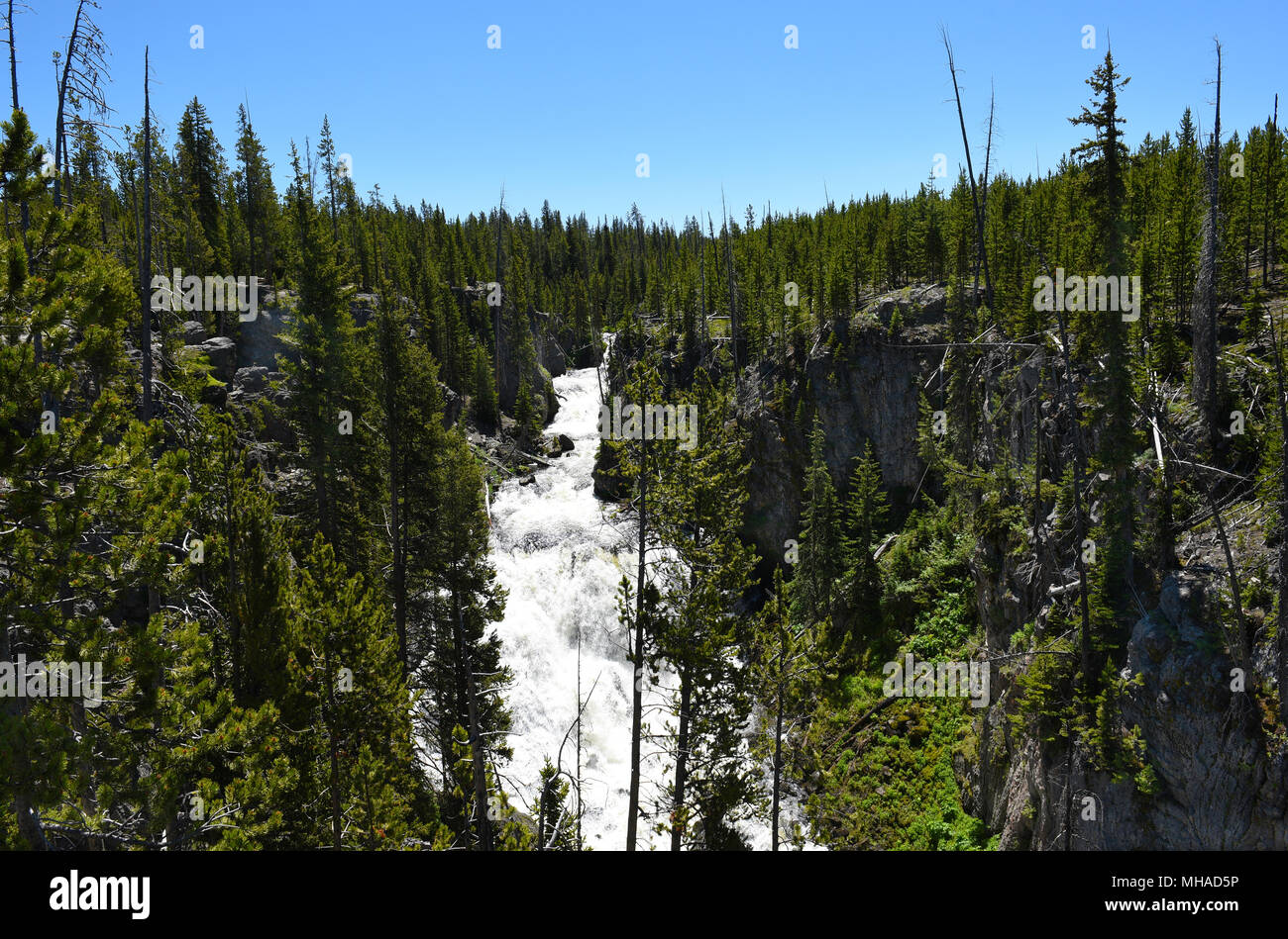 Kepler Cascades ist ein Wasserfall an der Firehole River im Südwesten der Yellowstone National Park. Die Kaskaden fallen etwa 150 Fuß über mehrere Stockfoto