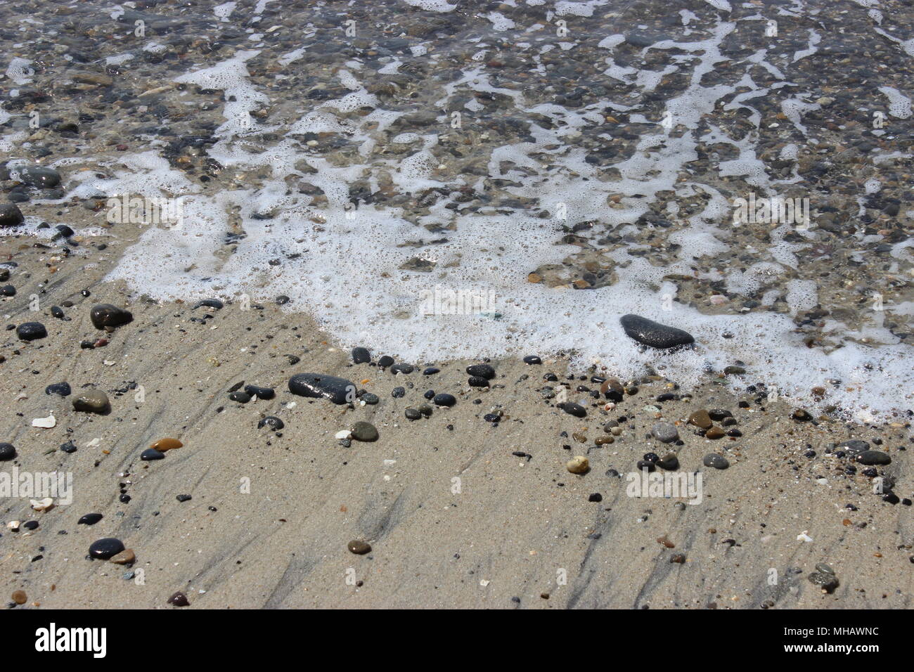 Sand und Kieseln am Strand, südliche Kalifornien Stockfoto