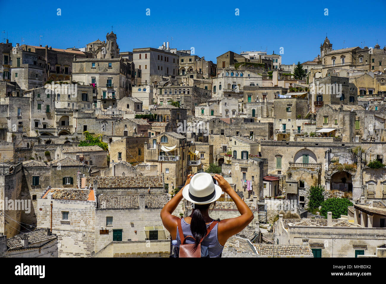 Frau unter Foto von Matera, Italien Stockfoto