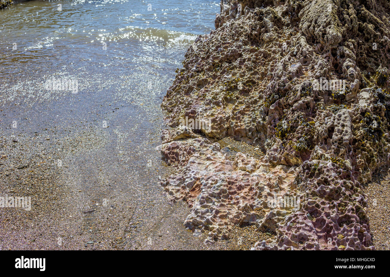 Vulkanischen Felsen an der Spitze des Llanddwyn Island auf Anglesey, Nordwales. Stockfoto