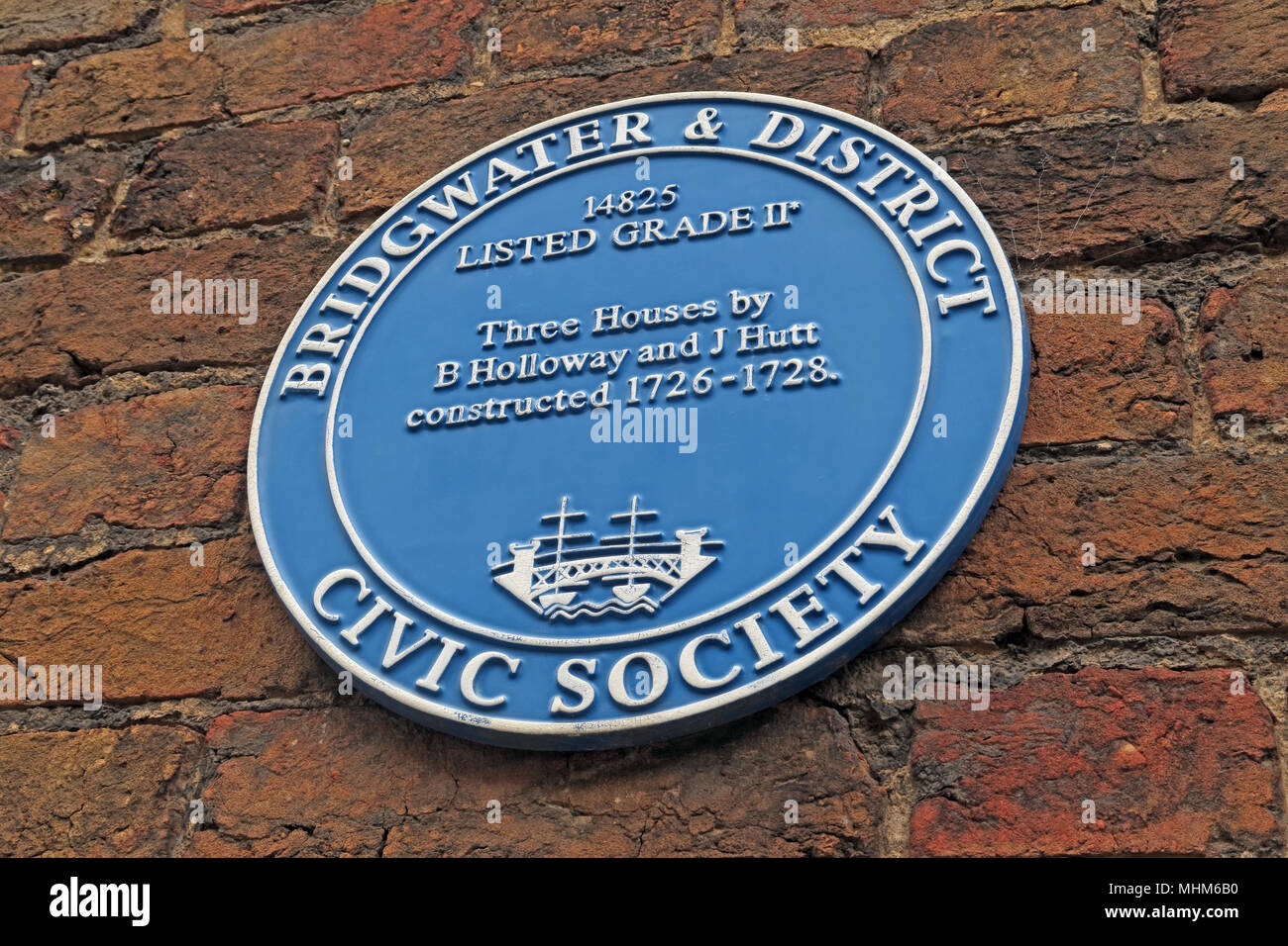 Bridgwater & Bezirk der bürgerlichen Gesellschaft blaue Plakette drei Häuser von Holloway und Hutt, North Somerset, England, Großbritannien Stockfoto