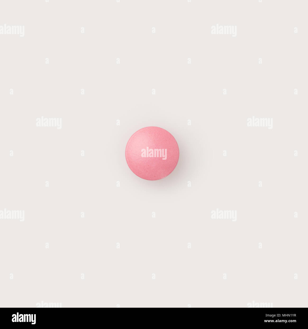 Eine rosa Pille Stockfoto