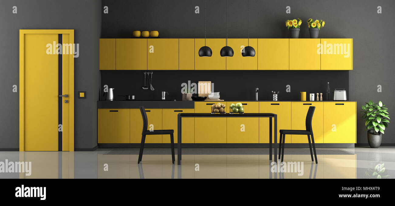 Schwarz und Gelb, moderne Küche mit Esstisch und Stühlen - 3D-Rendering Stockfoto