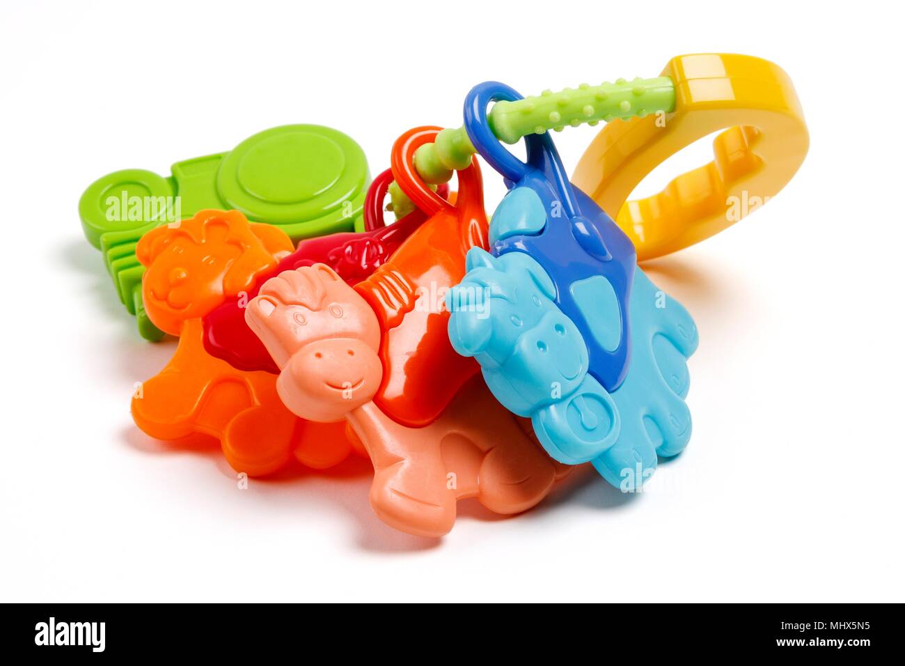 Ein Babys farm animal Rassel Spielzeug, Schuß auf Weiß mit einem Schlagschatten. Stockfoto
