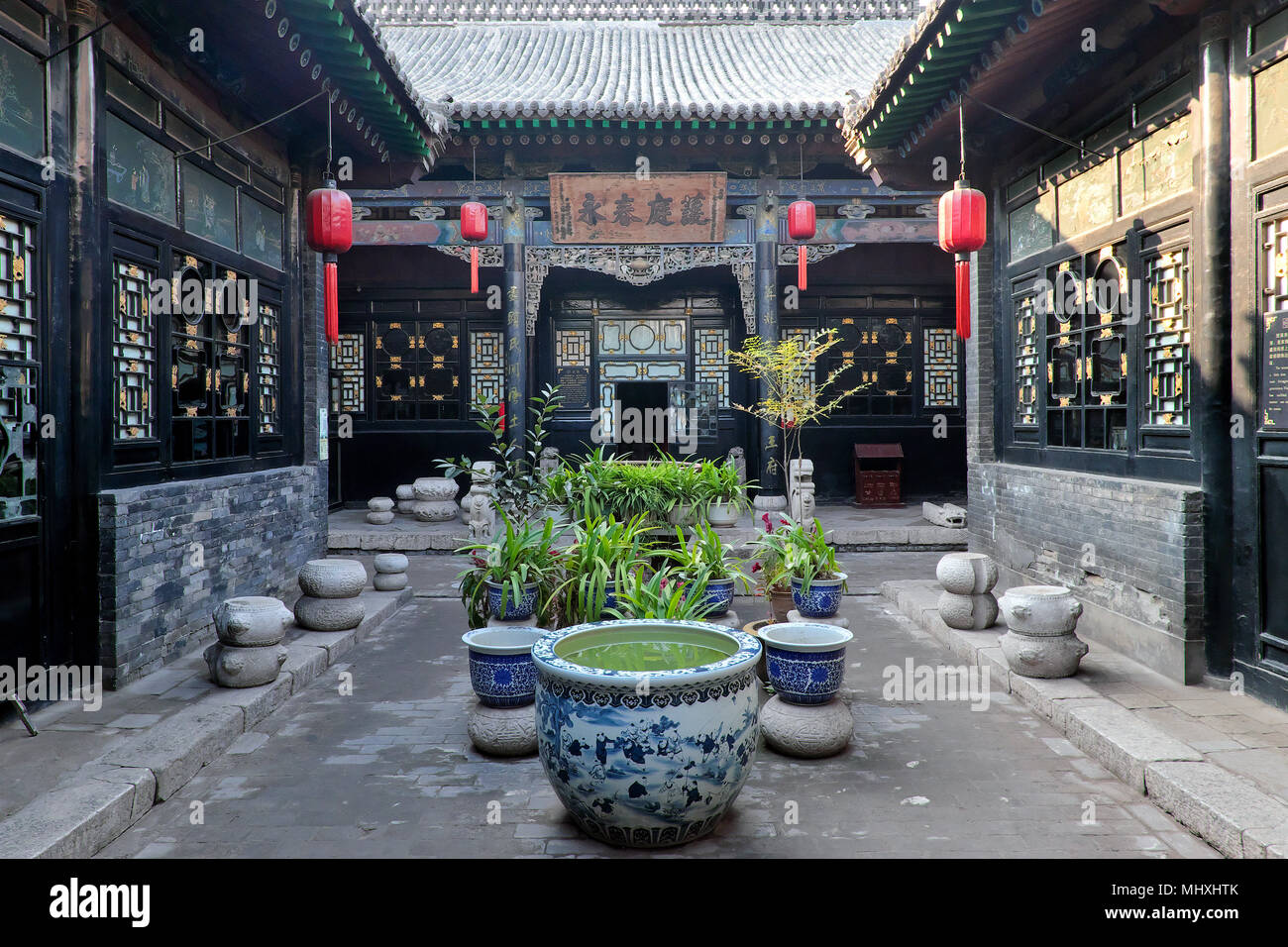 Innenhof eines alten, traditionellen Haus, die alte Stadt von Pingyao, Shanxi Province, China Stockfoto