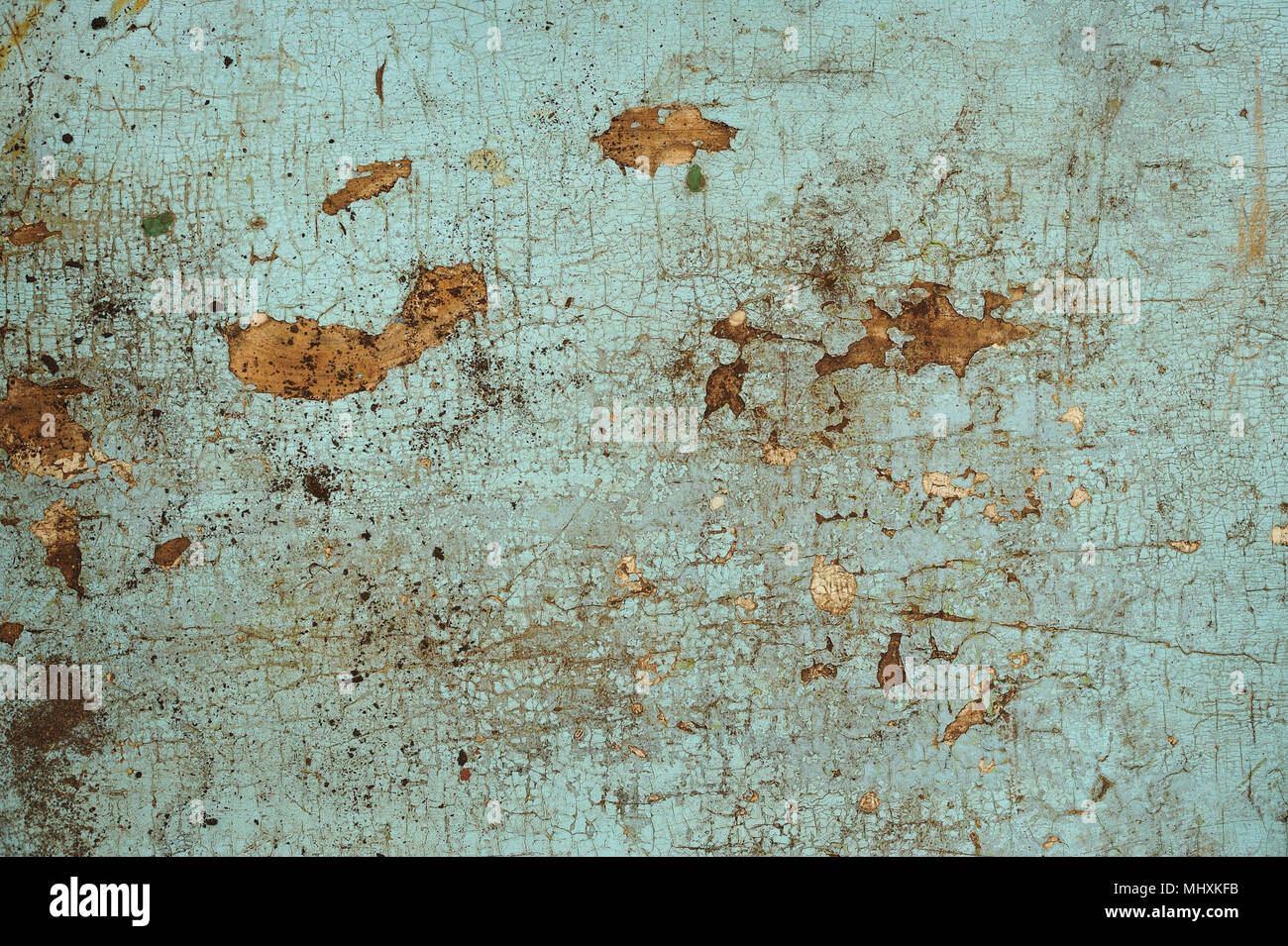 Risse in der blauen Farbe auf einem alten hölzernen Oberfläche Stockfoto
