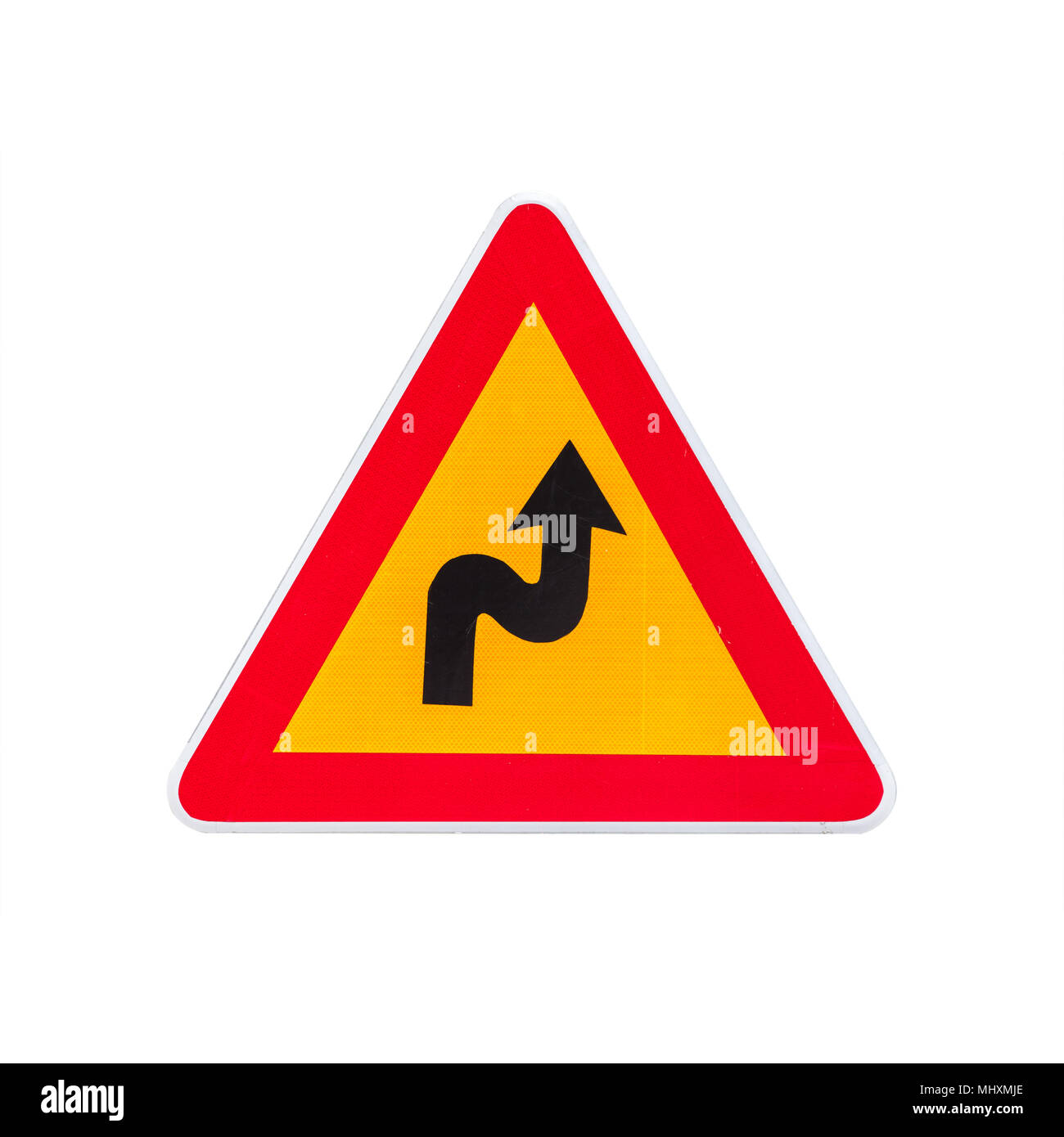 Gefährliche Kurven, Warnung Verkehrsschild auf weißem Hintergrund Stockfoto