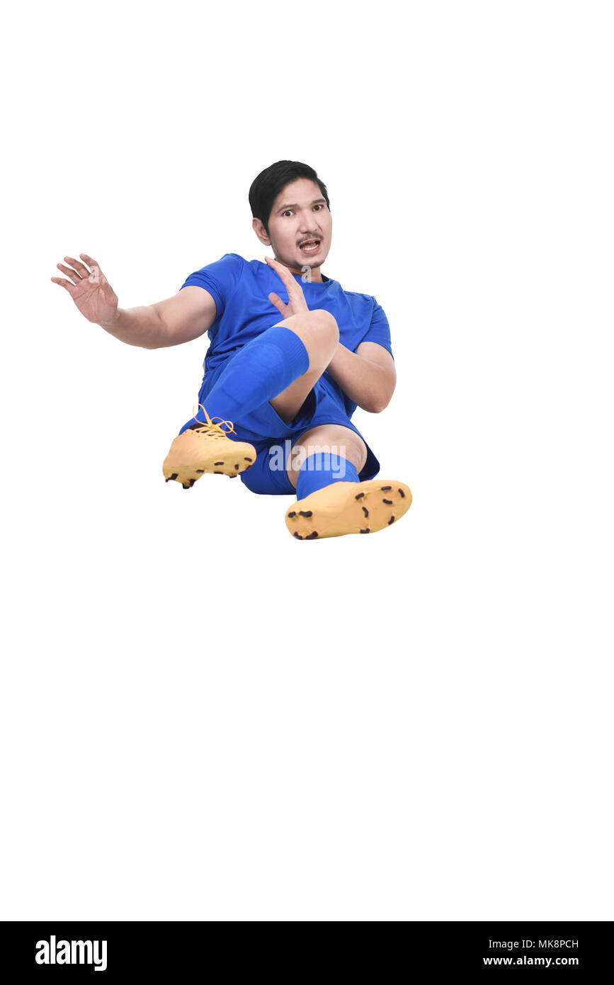 Bilder der asiatischen männlichen Fußball-Spieler tun Sie diese auf weißem Hintergrund angehen Stockfoto