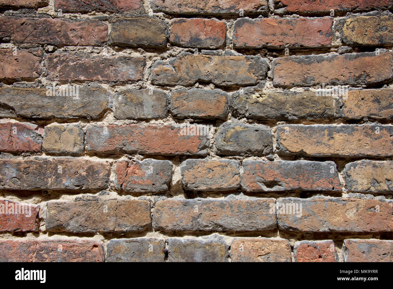 Alte Steinmauer als Hintergrund Stockfoto