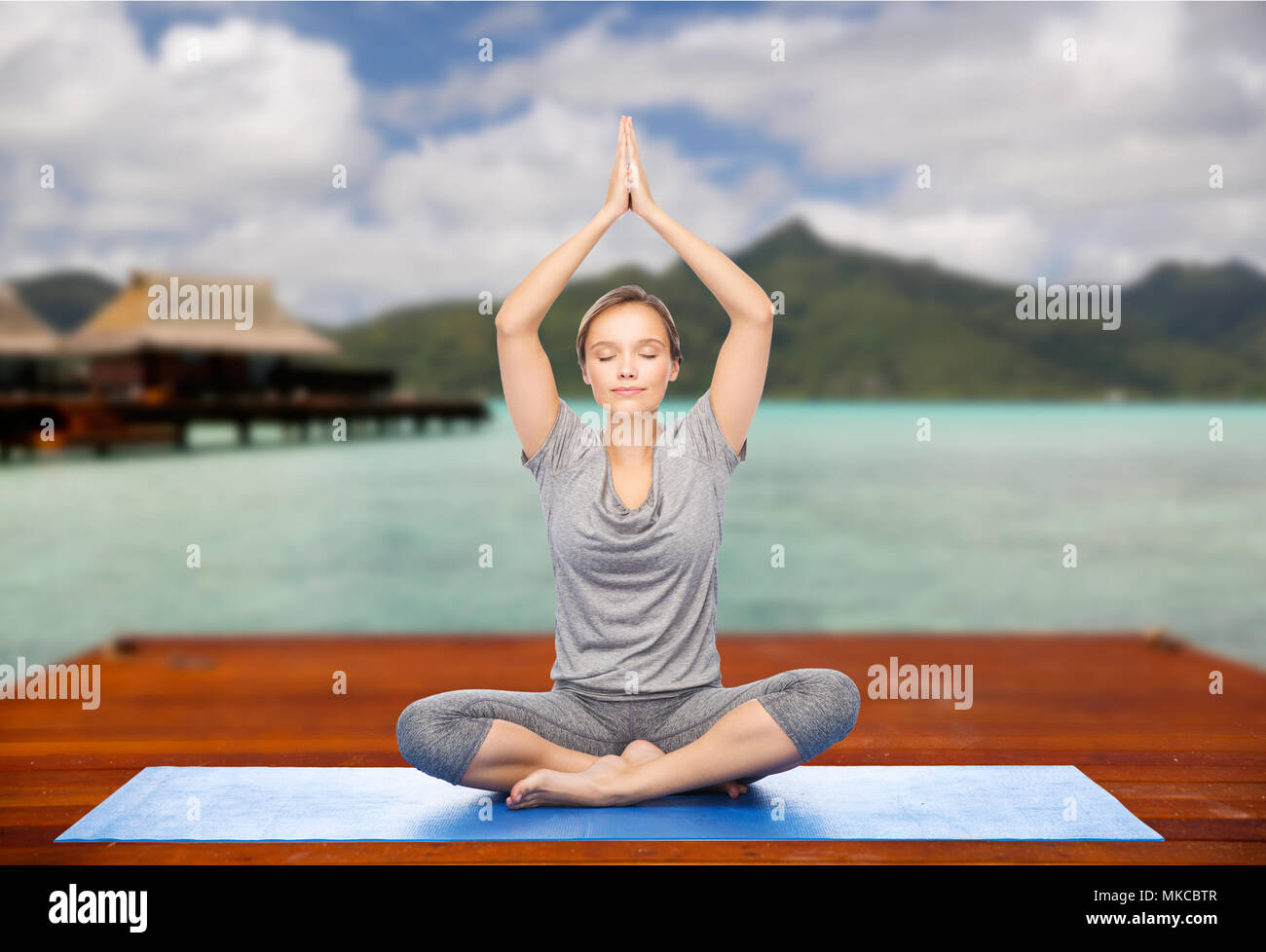 Frau, Yoga und Meditation im Lotussitz Stockfoto